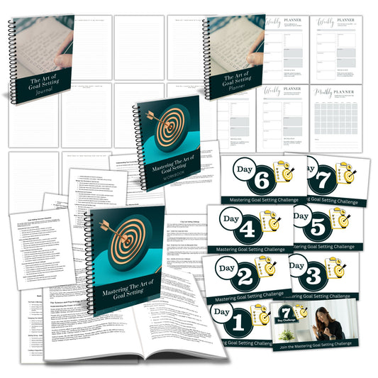 Collection of goal-setting materials including books, planners, and challenge cards.